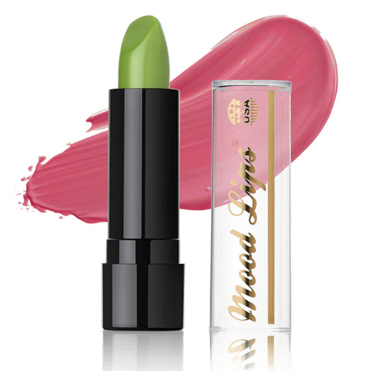 A Mood Lips Color Changing Lipstick in a black tube stands beside a clear cap with gold writing, a pink smear in the background—ideal for anyone seeking long-lasting, custom-color lips.