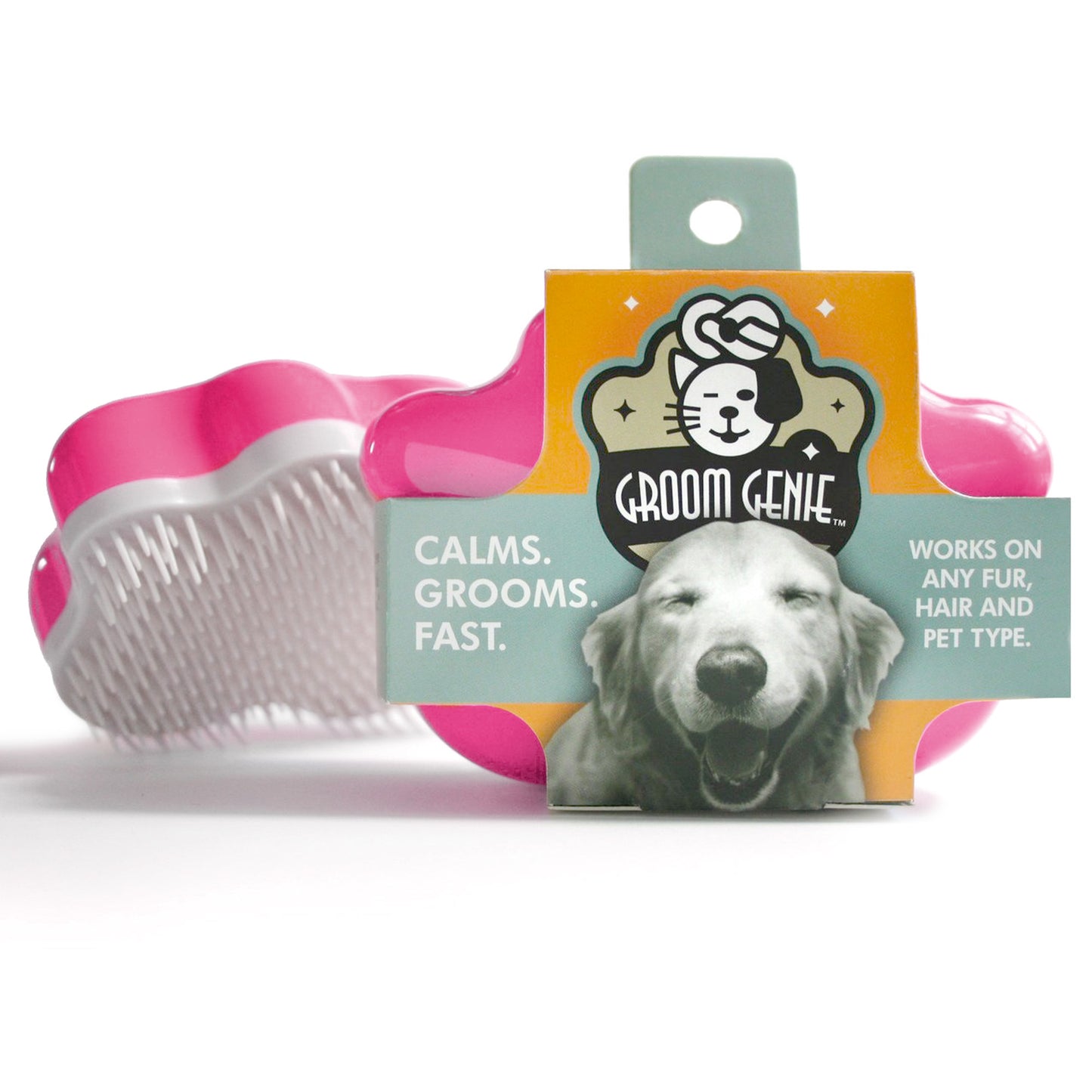 The Groom Genie Original Pet Detangling Brush in pink and white packaging features a happy dog image. The label says Calms. Grooms. Fast. and it works on any fur, hair, or pet type with its unique bristle design.