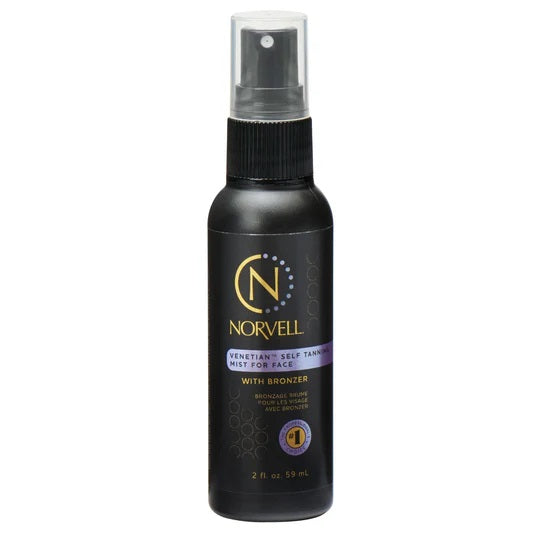 A travel-friendly black 1.7 oz spray bottle of Norvell Venetian™ Self Tanning Face Mist, featuring gold and purple accents and the Norvell logo, delivers a natural-looking color while standing upright against a white background.