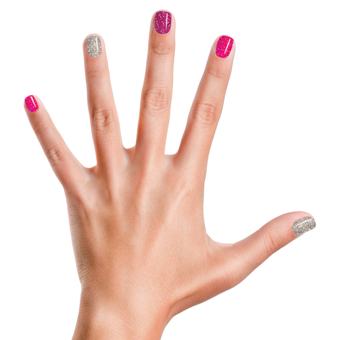 A hand with fingers spread apart showcases nails painted alternately in glittery pink and silver using Piggy Paint Sparkle, Sparkle cruelty-free vegan nail polish against a white background.
