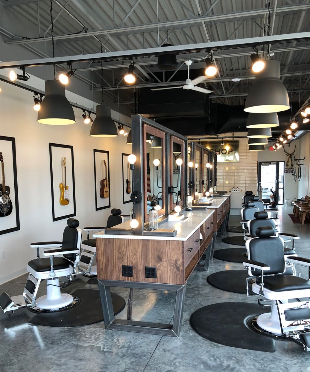 Buy Rite salon anti fatigue mat under barber chairs in modern salon with wooden styling stations