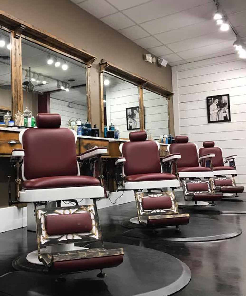 Buy-Rite comfort salon floor mat shown as round black anti fatigue mats under maroon barber chairs in salon