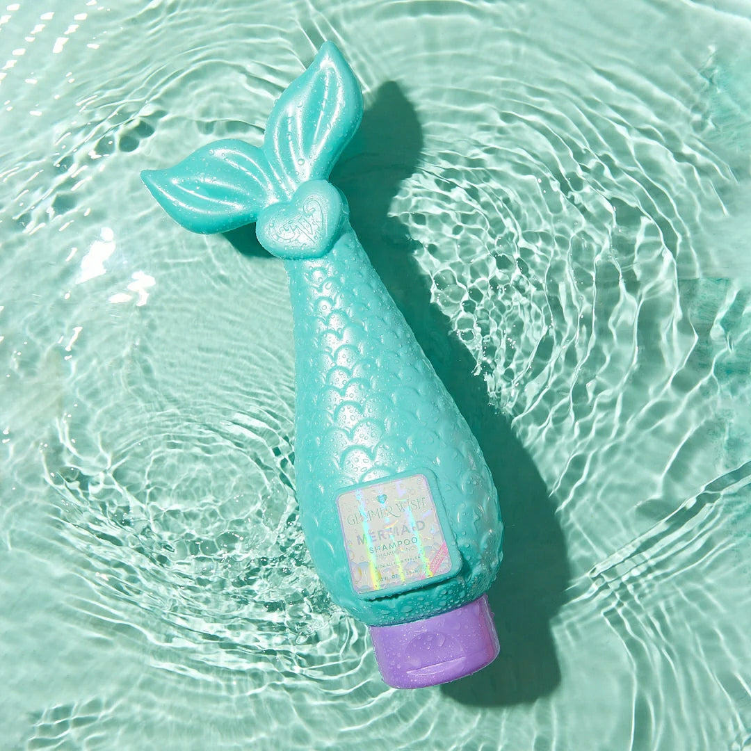 Glimmer Wish Mermaid Shampoo shaped like a mermaid tail, designed for nourishing hair in a vibrant ocean setting