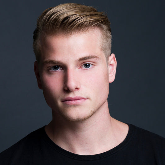 Stylish hairstyle achieved with Johnny B Clash Hair Fixative for a strong hold and sleek finish