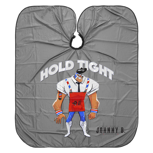 Johnny B. cutting cape featuring a cartoon character and the phrase Hold Tight for barbers and stylists