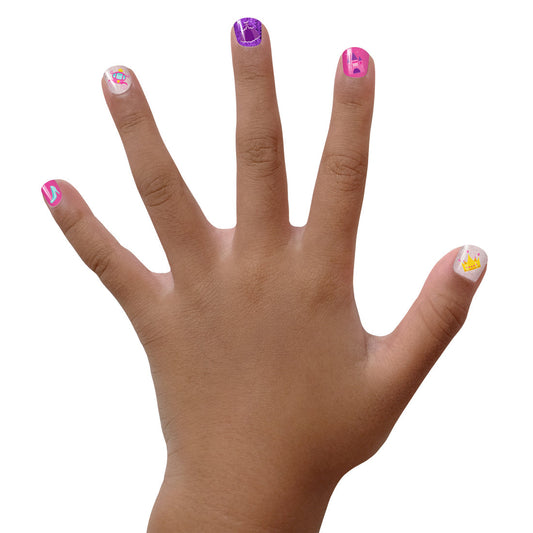 Child's hand showcasing colorful nail art with Piggy Paint starter set for creative fun