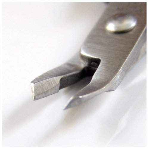 Close-up of Seki Edge cuticle nipper with precision stainless steel blades for manicures