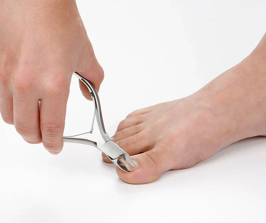 Seki Edge nail clippers in use for precise toenail trimming, designed for optimal control and comfort