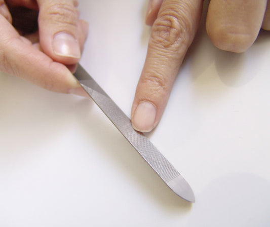 Seki Edge nail file with cuticle pusher for precise nail grooming and maintenance