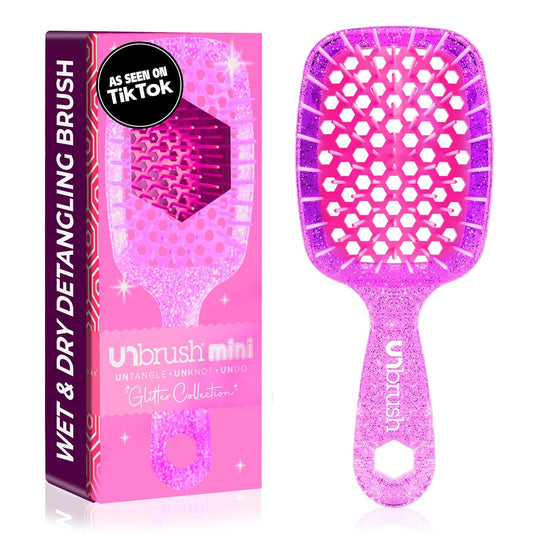Unbrush mini detangling hair brush in pink glitter finish with durable design for easy hair styling