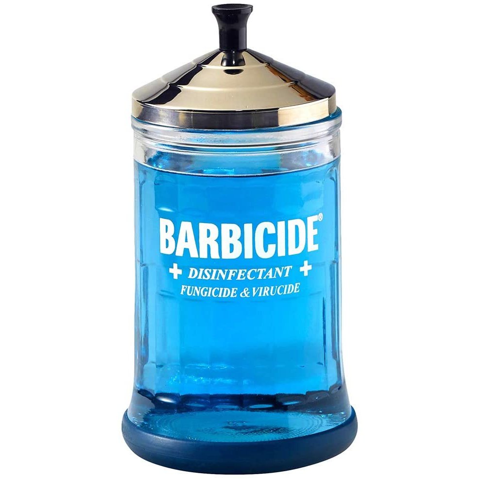 The Barbicide Jar - Midsize is a clear glass jar with a silver lid and black knob, designed for holding Barbicide disinfectant solution to sanitize combs and barber tools in barbershops.