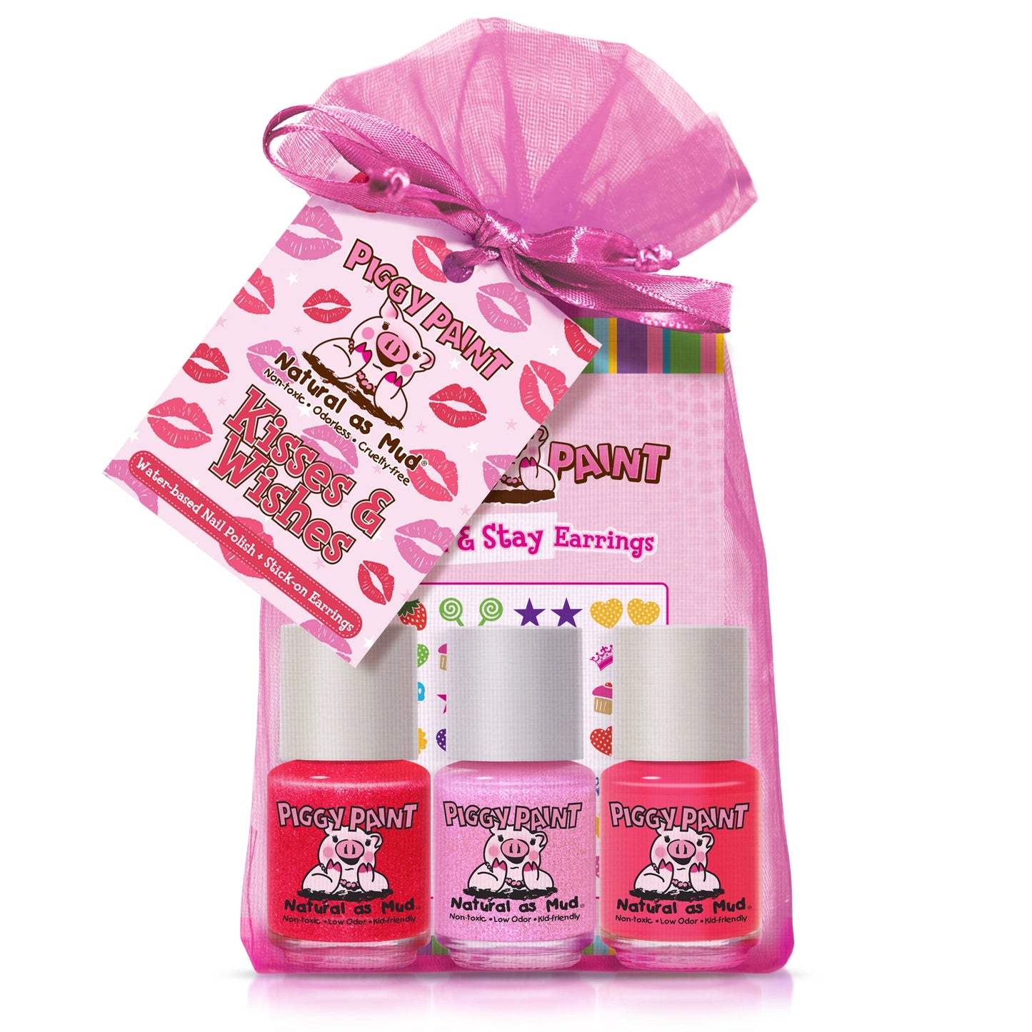 The Piggy Paint Kisses & Wishes Gift Set includes a pink mesh bag with three non-toxic nail polishes (white, pink, red), a Kisses & Wishes tag, and a pig-themed sticker sheet—perfect for a fun, kid-friendly manicure.