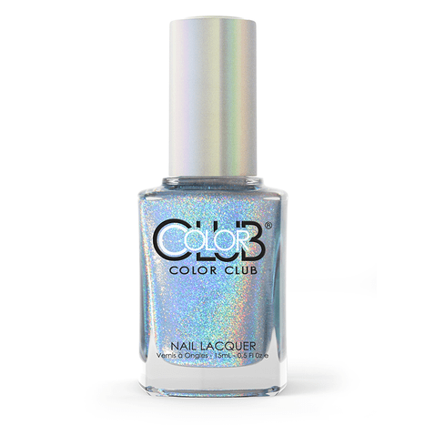 A bottle of Color Club Holographic Nail Lacquer with a shiny silver label and cap contains a sparkly, iridescent light blue polish that dazzles with a rainbow holographic effect.