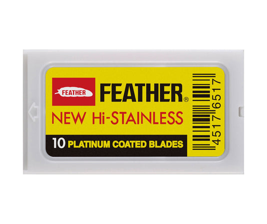 A plastic case of Feather Hi Stainless Platinum Coated Double Edge Blades, featuring a yellow and black design, barcode, and red Feather logo. Each blade delivers a sharp, smooth shave. Labeled 10 Platinum Coated Blades.