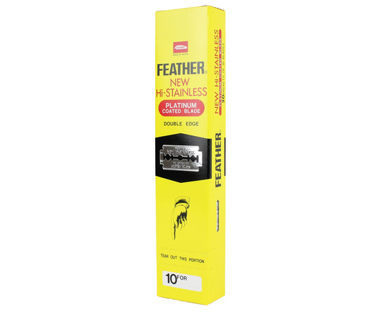 A yellow box of Feather Hi Stainless Platinum Coated Double Edge Blades features black and red text, a feather illustration, and a razor blade image on the front.