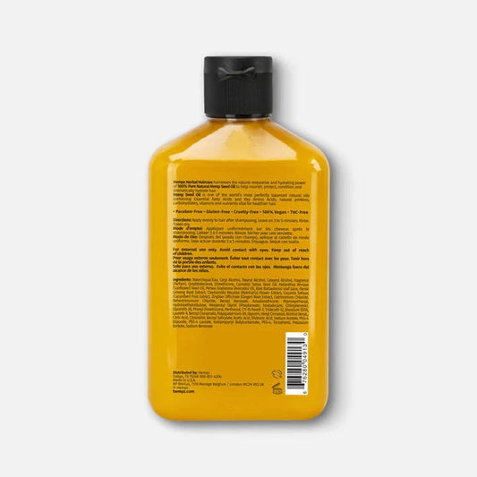 A yellow rectangular bottle with a black flip-top cap, shown from the back. The label lists Hempz 8.5oz Conditioner details, Enchanted Grapefruit scent info, directions, ingredients, and a barcode in black on yellow.