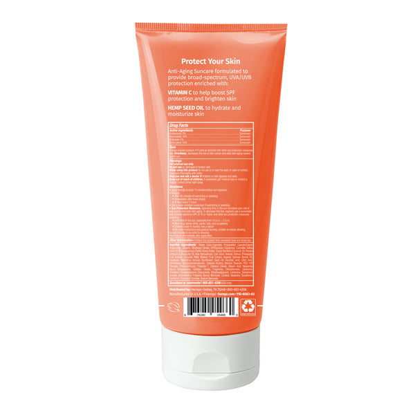 Back of Hempz Sweet Pineapple & Honey Melon Herbal Body Sunscreen 6 oz. SPF 50 tube, orange with white cap, shows product info, drug facts, and usage instructions in white text—formulated with nourishing hemp seed oil.