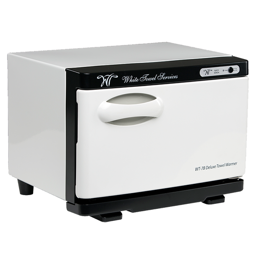 The White Towel Services Deluxe Towel Warmer - WT-7B is a compact, rectangular white unit with a black top, base, and front panel featuring a curved handle and right-side control buttons. “White Towel Services” is printed on the front. Lifetime warranty included.