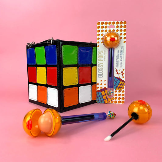 Glossy Pops 80's inspired lip balm and gloss with colorful packaging and retro design