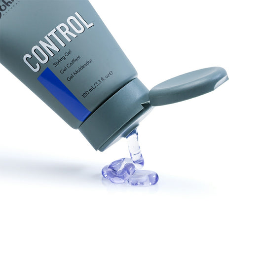 Johnny B Control Styling Gel in a squeeze bottle with gel oozing out for precise hairstyles