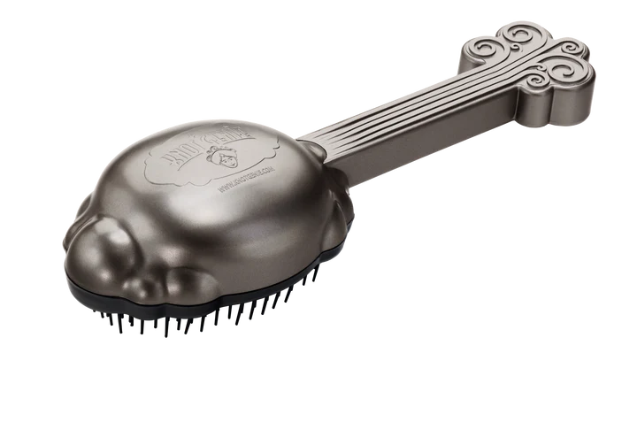 Knot Genie detangling brush in silver, designed for effortless untangling of hair without pulling or breakage