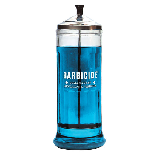 Large Barbicide jar filled with blue disinfectant for salon and spa use