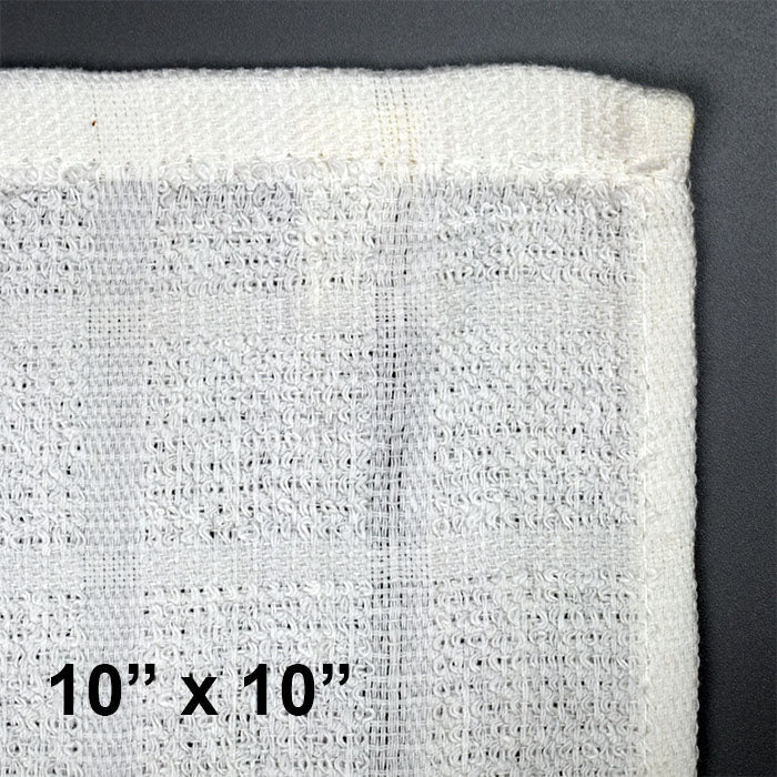 Detailed view of a 10x10 inch spa towel with textured stitching and soft, absorbent finish.