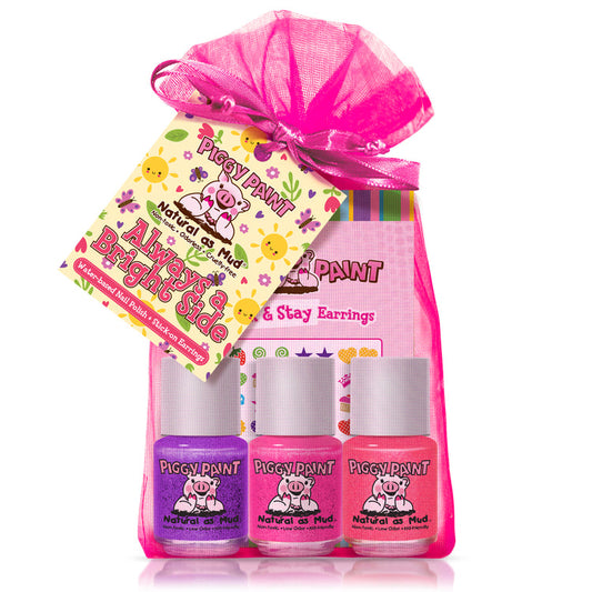 Piggy Paint gift set with three vibrant nail polishes and stay earrings in a colorful pouch