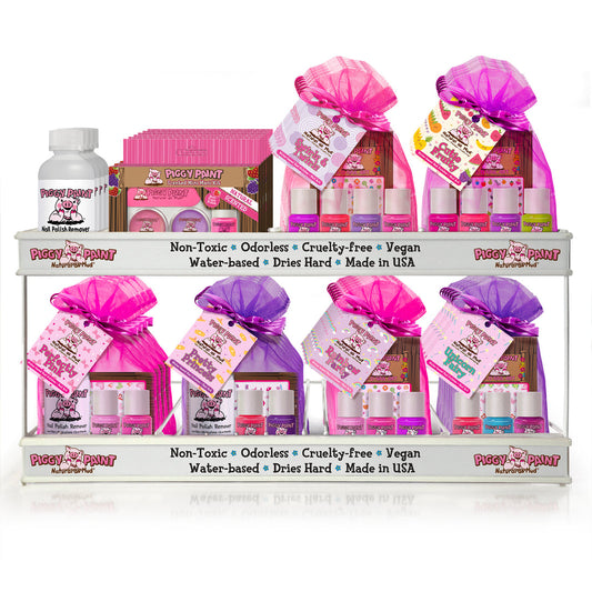 Piggy Paint gift set with non-toxic nail polish, remover, and vibrant colors in pink packaging