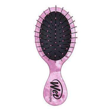 Wet Brush Mini Detangler in pink, designed for pain-free detangling of all hair types