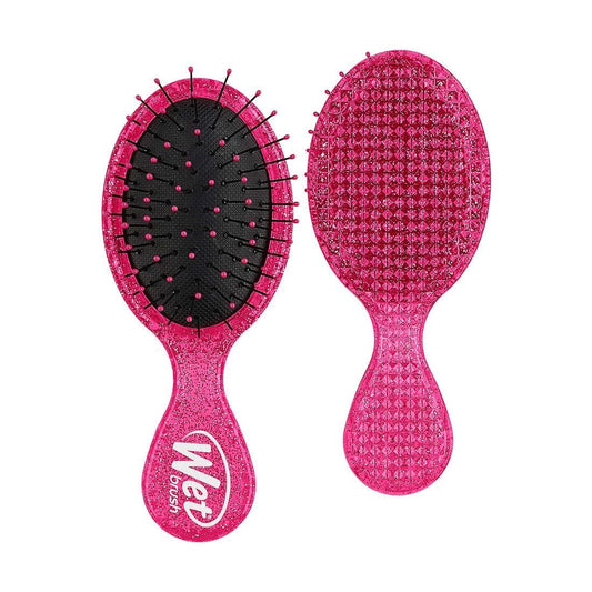 Wet Brush Mini Glitter Detangler with a vibrant pink design for effortlessly untangling hair