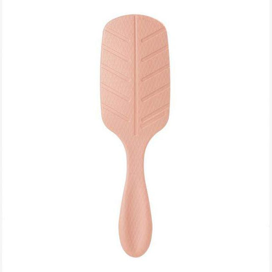 Wet Brush oil infused detangling brush in soft pink for gentle hair care and easy detangling