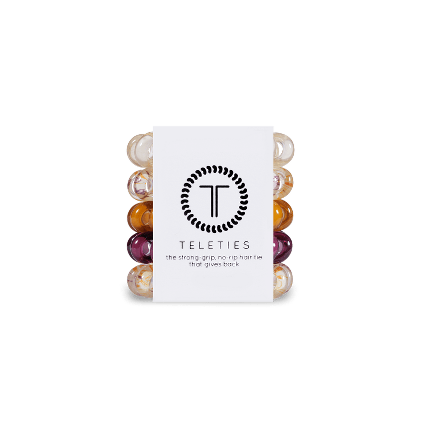 Teleties tiny hair ties in assorted colors packaged for strong, no-slip hold and style