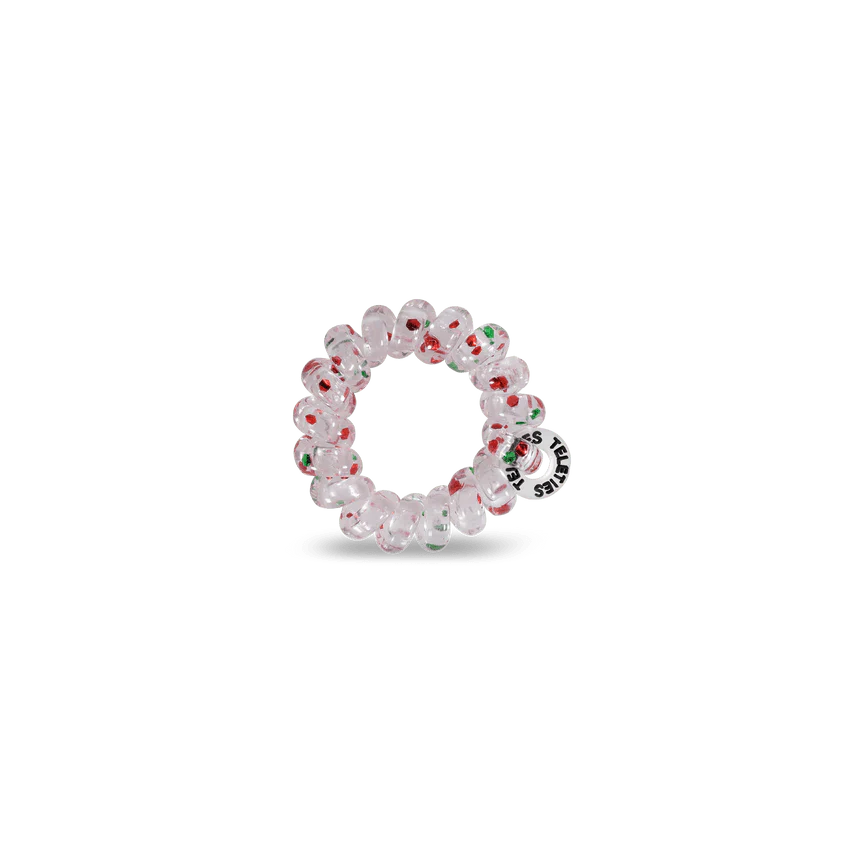 Teleties tiny hair ties in clear with festive red and green design for easy and stylish hair styling