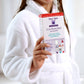 Fairy Tales lice removal kit for kids held by child in white bathrobe showing box details