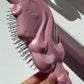 Glimmer Wish unicorn detangling hair brush in pink with a unicorn design and flexible bristles