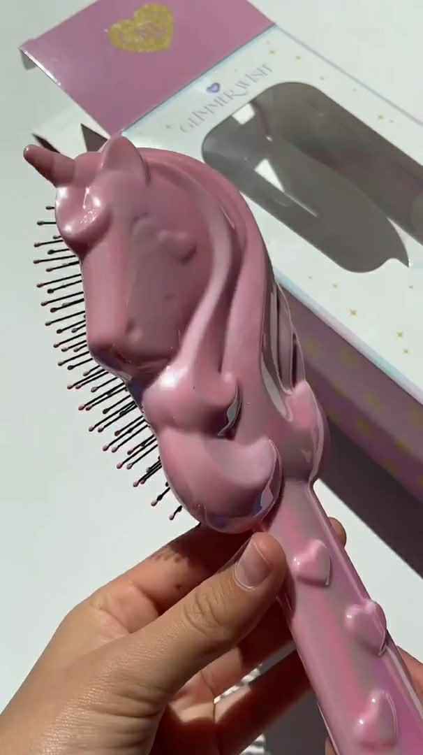 Glimmer Wish unicorn detangling hair brush in pink with a unicorn design and flexible bristles