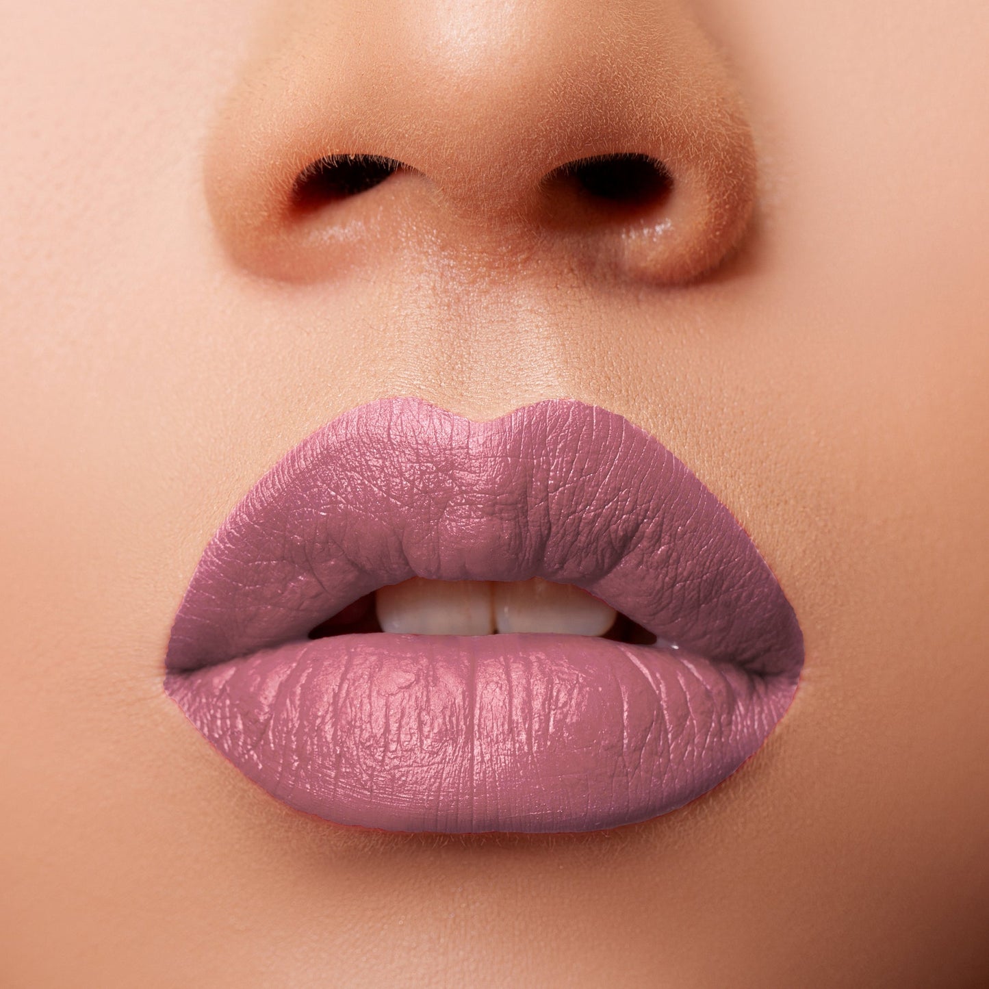 Glossy Pop Urban Lips Lipstick in a soft mauve shade applied on full lips