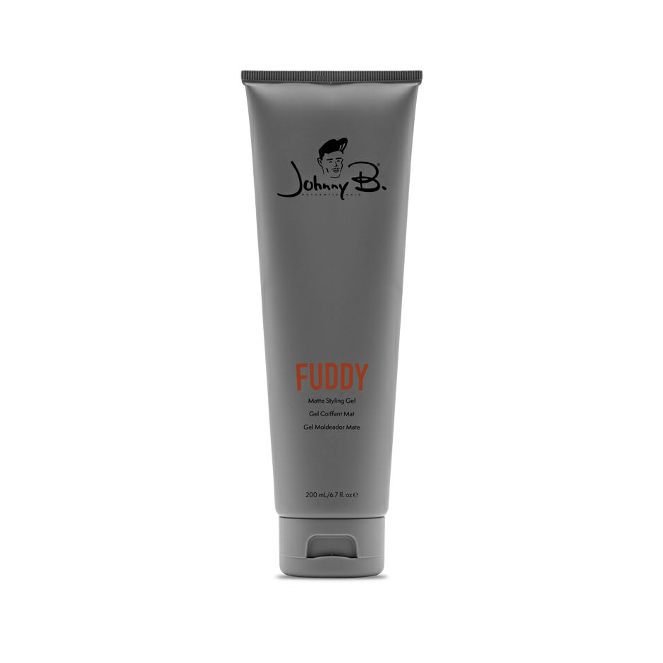 Johnny B Fuddy Matte Gel in a gray tube, providing strong hold for styled hair