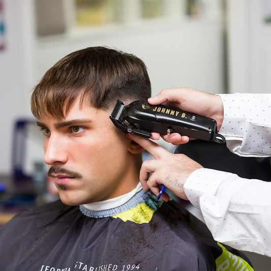 Johnny B hair clipper professional in use for a stylish haircut on a client