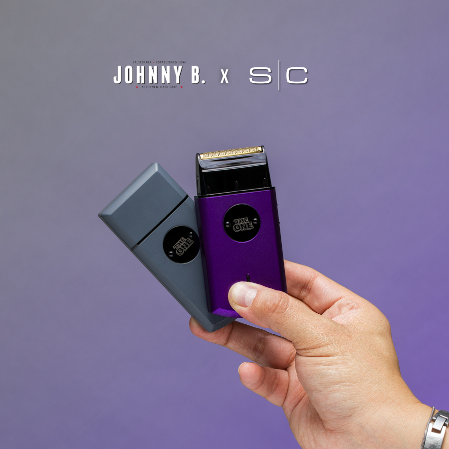 Johnny B The One shaver held in hand, showcasing a sleek design for precise grooming