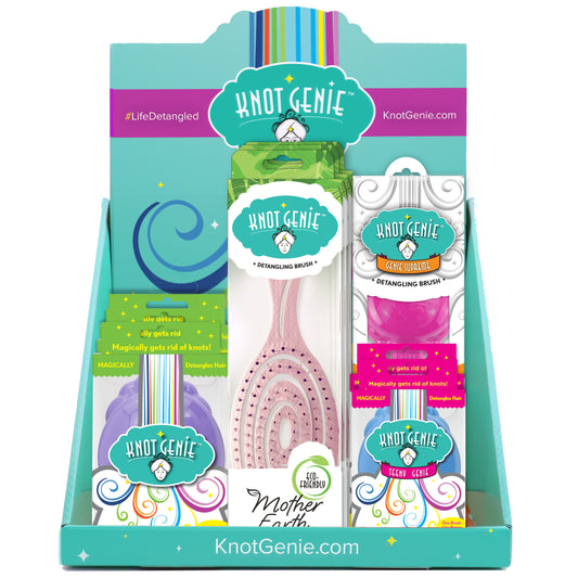 Knot Genie detangling brush display featuring various colors and styles of the detangling brushes