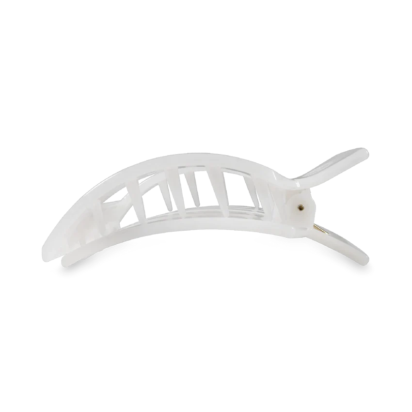 Medium white hair claw clip designed for secure styling and everyday use