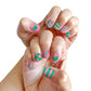 Bright pink and green nail designs featuring polka dots and hearts with Piggy Paint pen polishes