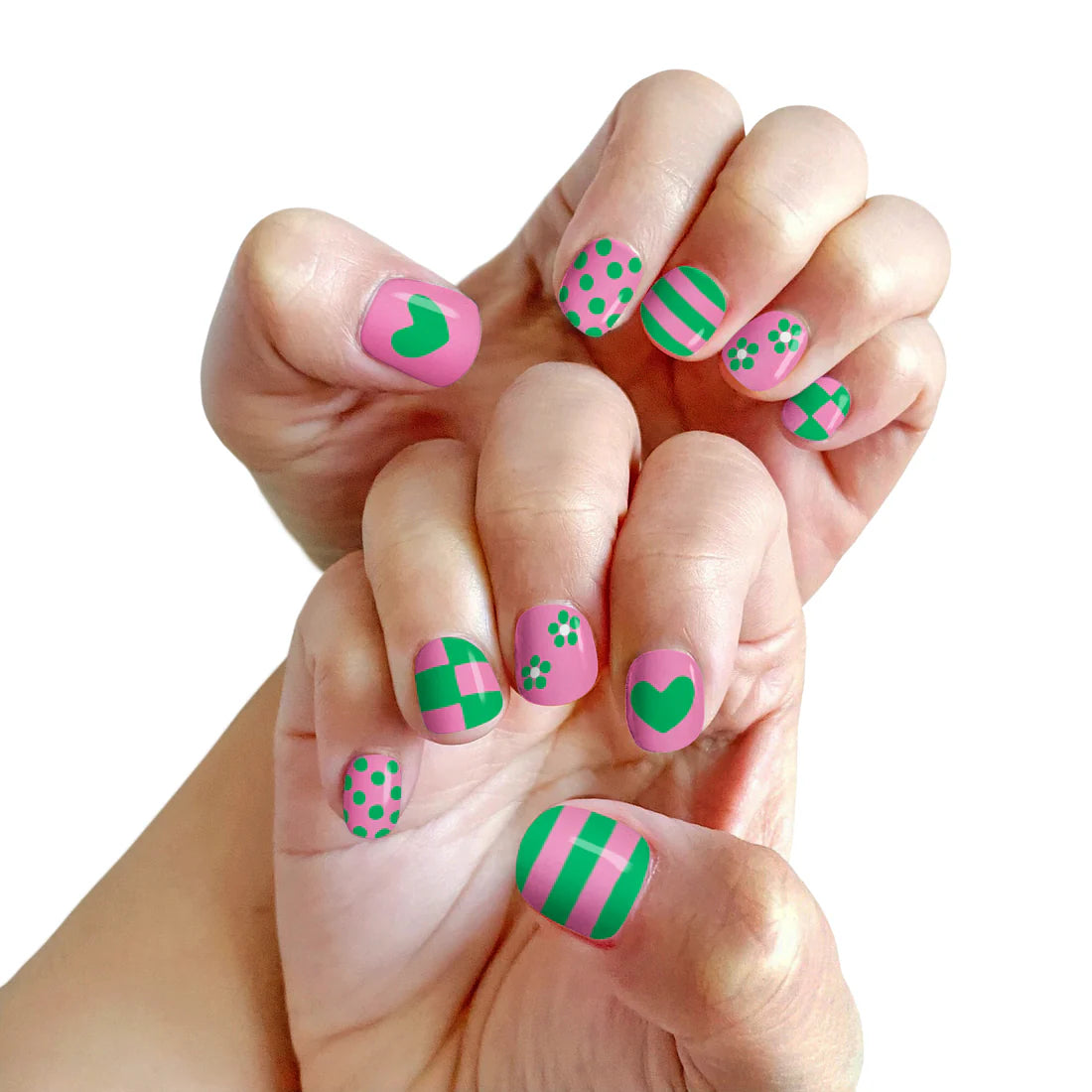 Bright pink and green nail designs featuring polka dots and hearts with Piggy Paint pen polishes