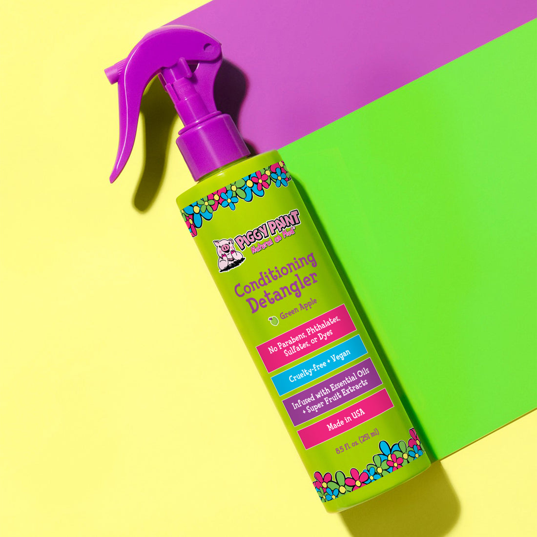Piggy Paint Rock the Locks Green Apple Detangler in a spray bottle for easy hair styling