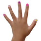 Child's hand showing colorful nails with Piggy Paint Sparkle nail polish set for fun nail art