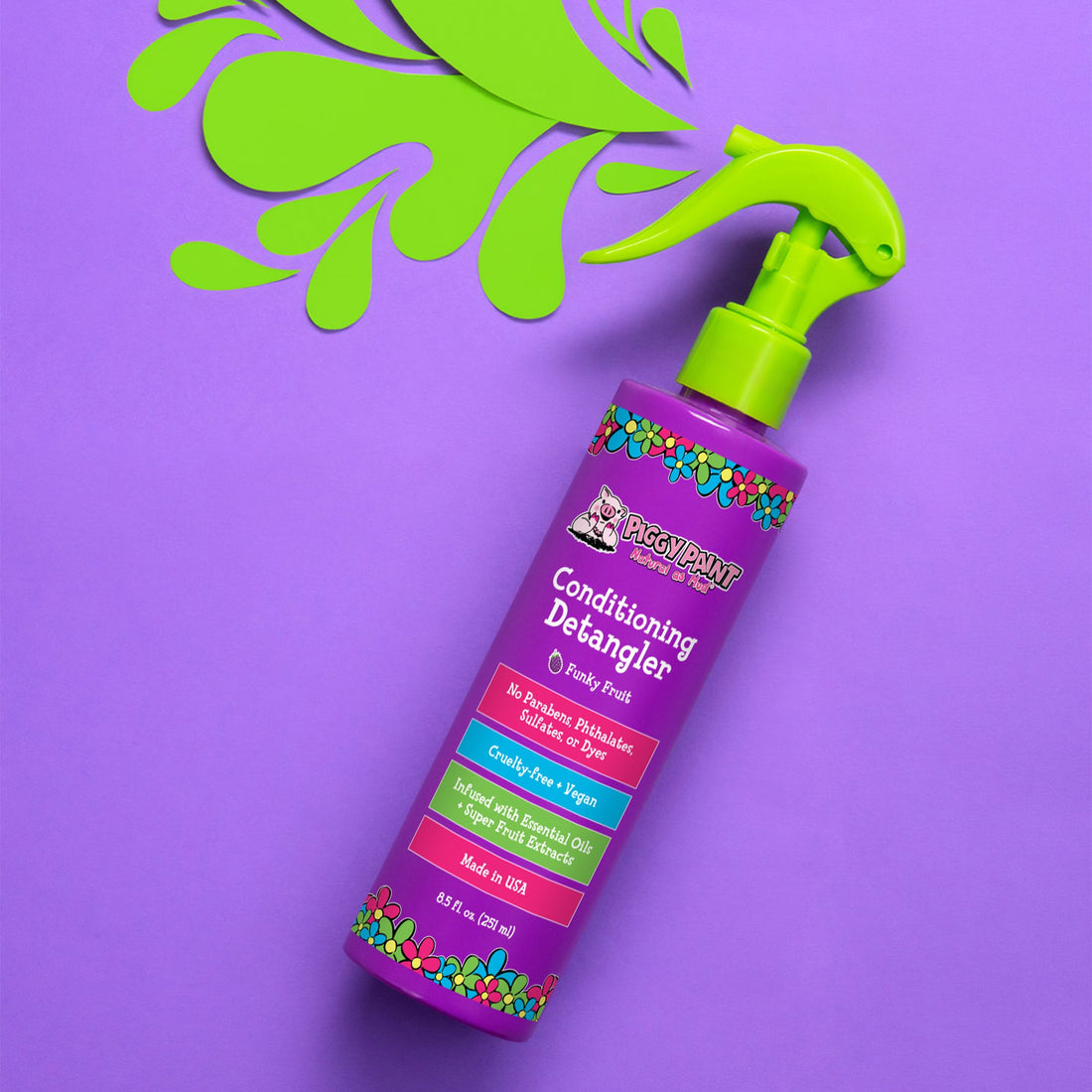 Piggy Paint Rock The Locks funky fruit detangler in a vibrant spray bottle for easy hair care