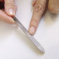 Seki Edge nail file with cuticle pusher for precise nail grooming and maintenance