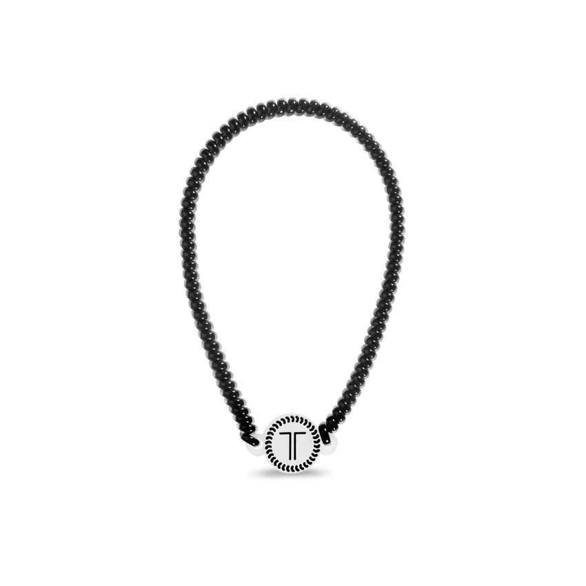 Teleties headband in black with a stylish circular logo for all-day hold and comfort